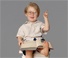 boy sitting on books