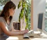 young woman working at computer