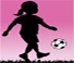 young girl playing soccer